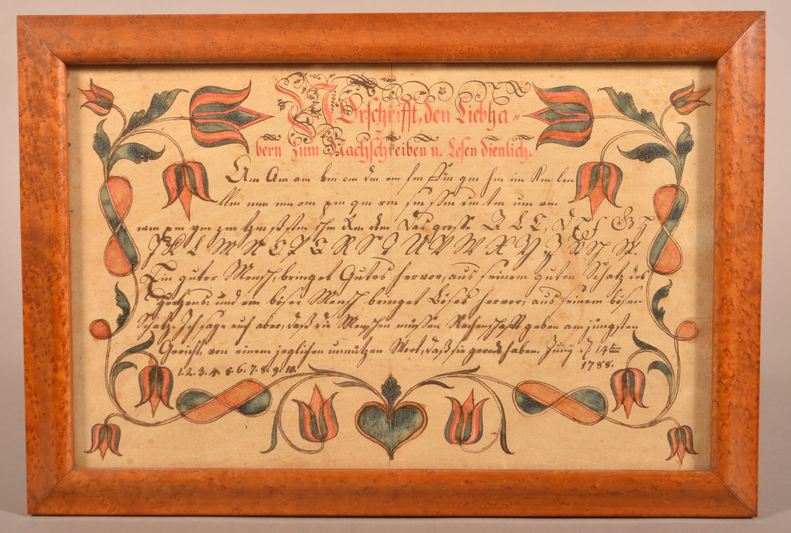 Pennsylvania Watercolor and Ink Vorschrift Dated 1788.: Pennsylvania Watercolor and Ink Vorschrift Dated 1788. Writing sample fraktur with polychrome heart and tulip vine motif. In a later-period birdseye maple frame, 10" x 14-1/2" overall.