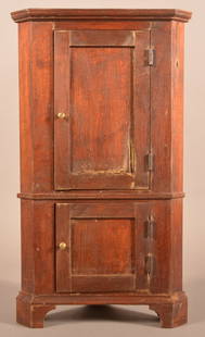 PA 19th Century Walnut Miniature Corner Cupboard.: Pennsylvania 19th Century Walnut Miniature Corner Cupboard. Single-part blind-door cupboard with molded cornice, upper and lower paneled doors, molded base with bracket feet. 24-1/4"h. x 14"w. x 8"d.