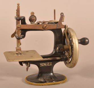 Antique/Vintage Child's Singer Sewing Machine.: Antique/Vintage Child's Singer Sewing Machine. Black enamel with gold trade mark. 6-3/4"h.