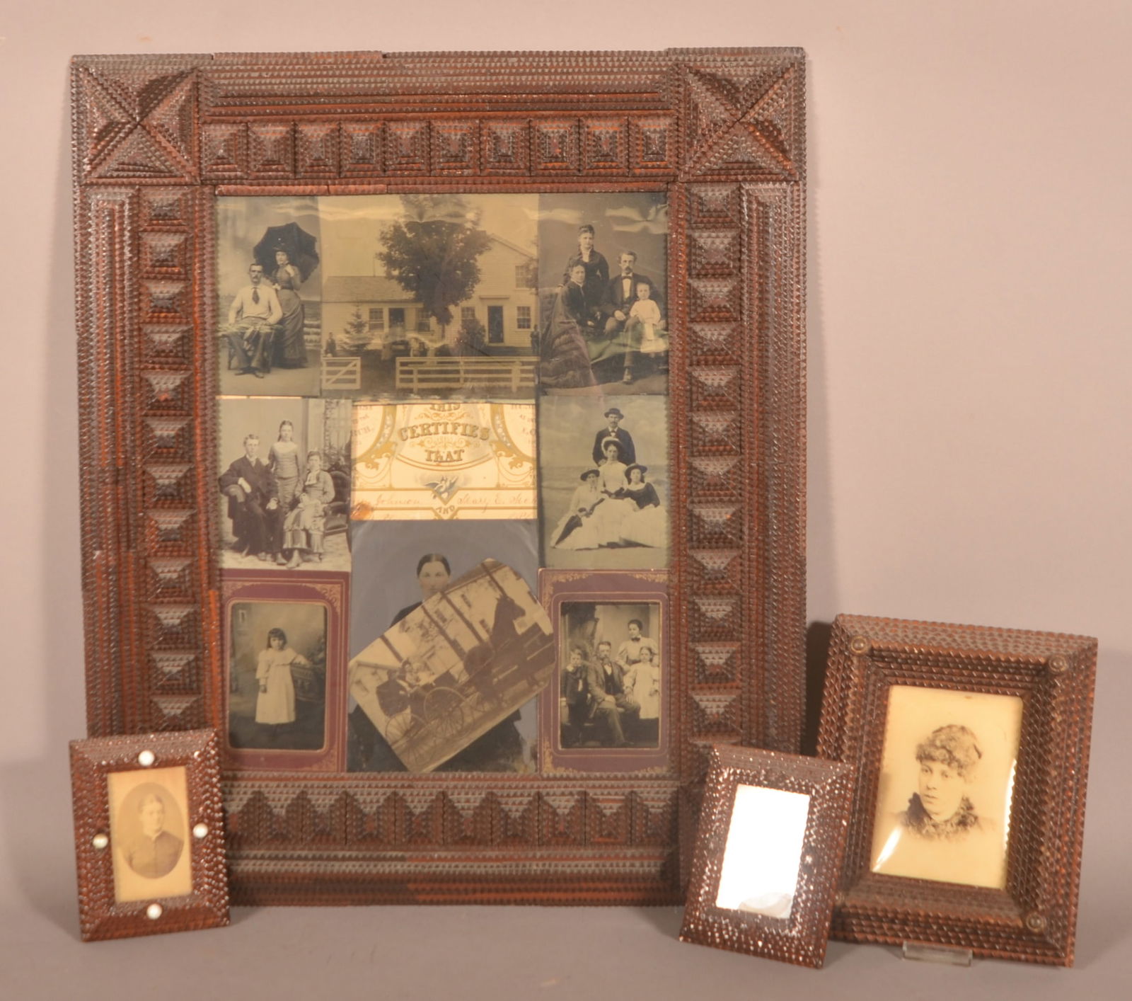 Four Antique Tramp Art Frames With Photos. Auction