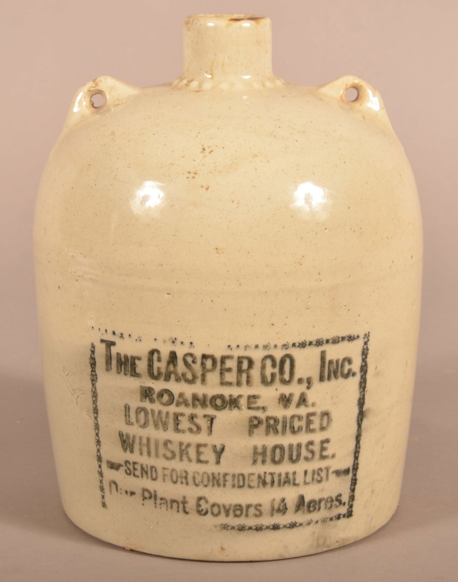 The Casper Co. Roanoke, VA Stoneware Whiskey Jug. (1 of 2)