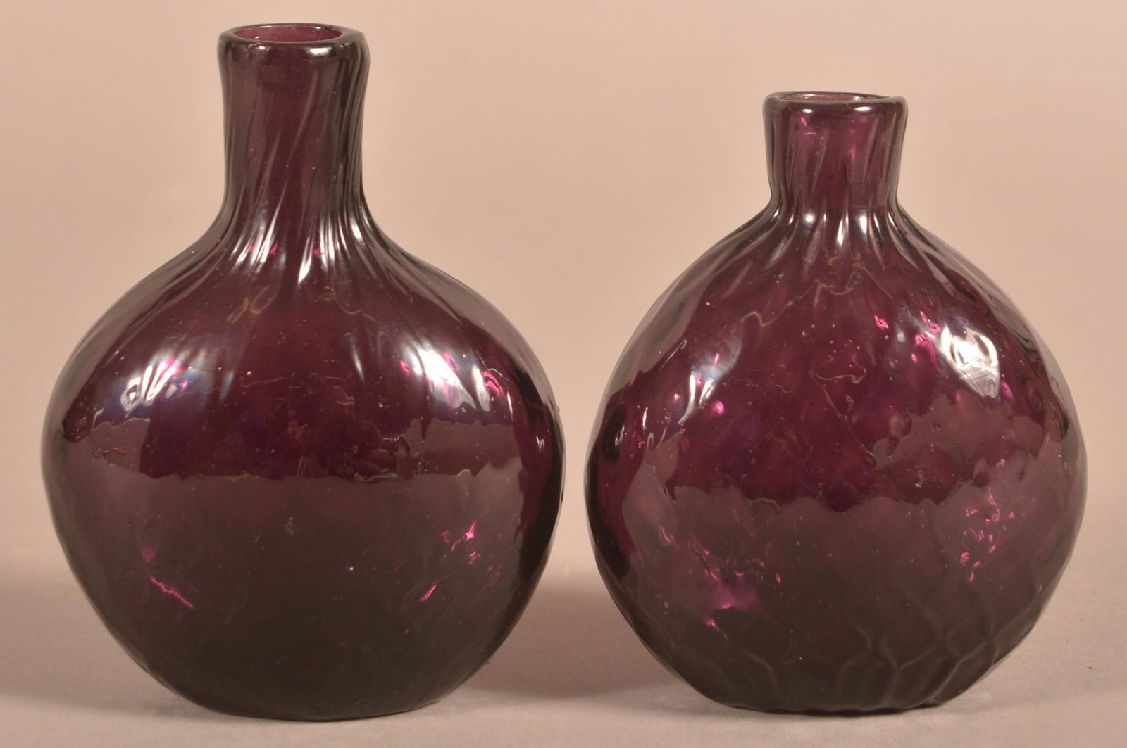 Two Stiegel-Type Blown Amethyst Small Flasks.: Two Stiegel-Type Blown Amethyst Expanded Diamond Small Flasks. 4-1/2"h. and 5"h.
