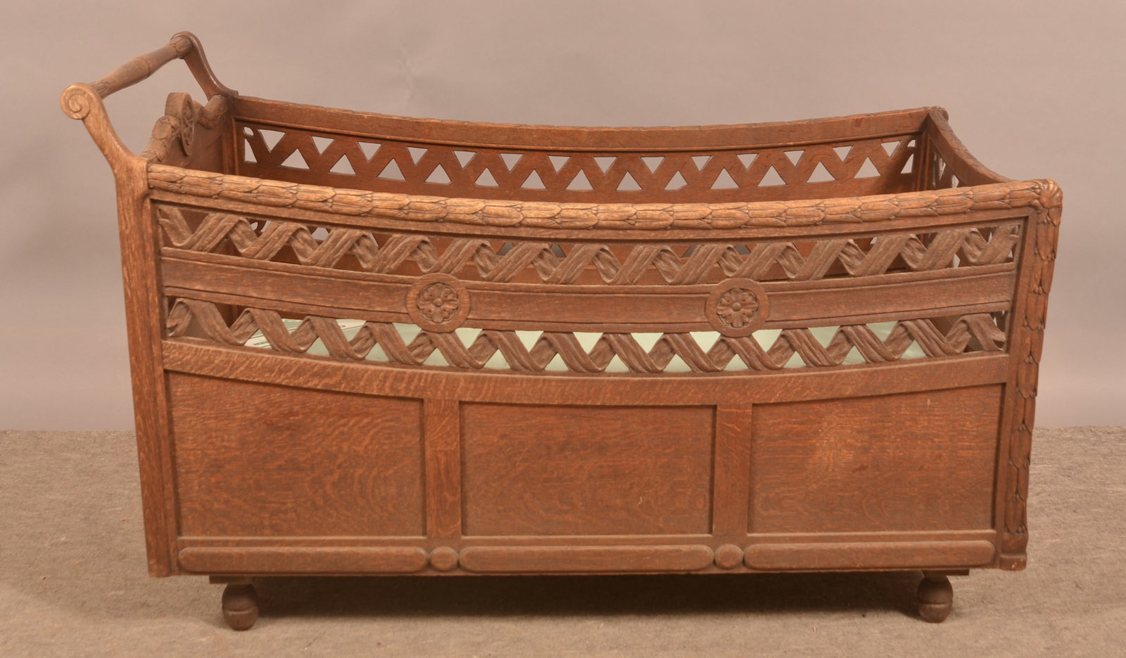 Continental 19th Century Carved Chestnut Crib.: Continental 19th Century Carved Chestnut Crib. 30"h. x 23"w. x 47"l.