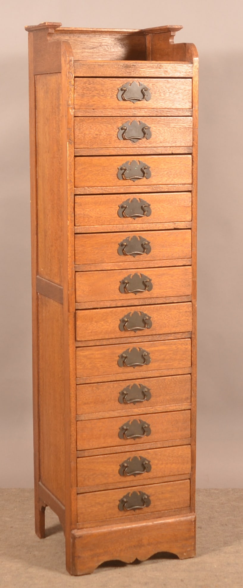Oak 12-Drawer Cabinet with Batwing Pulls. (1 of 4)