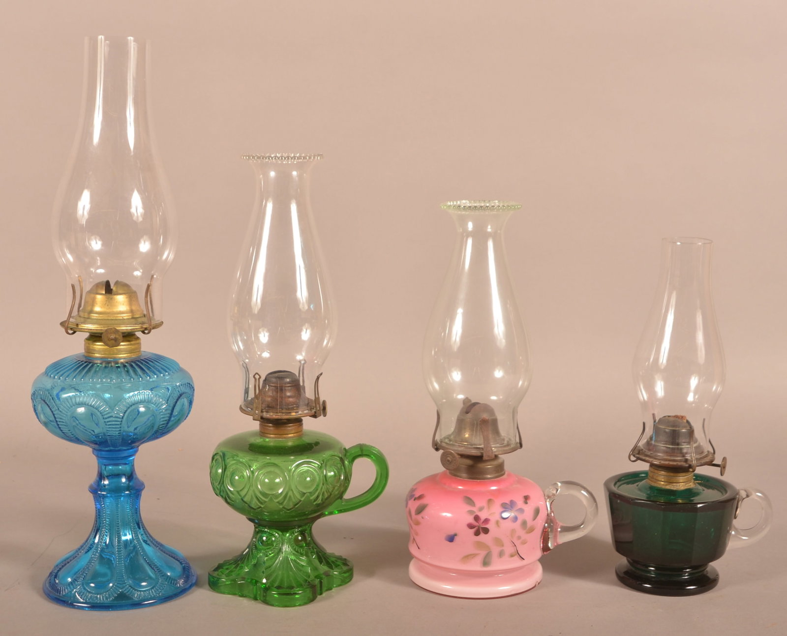 Four Antique Colored Glass Fluid Lamps. (1 of 3)