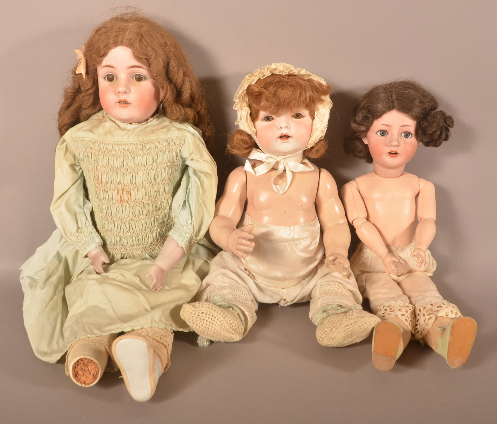 Three Antique German Bisque Head Girl Dolls. (1 of 8)