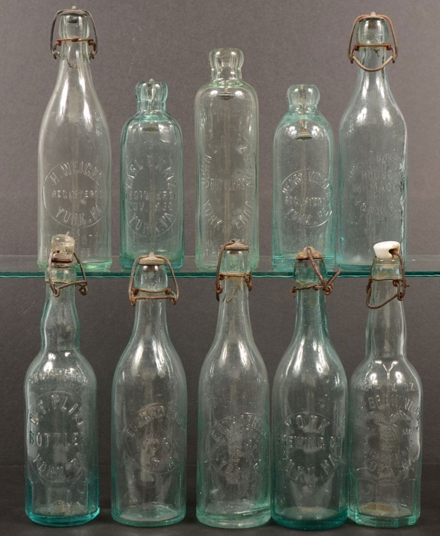 Ten Early 20th Century York, Pa. Beverage Bottles.: Ten Early 20th Century York, Pa. Beverage Bottles. Three blob top bottles with Hutchinson type stoppers: "Karl E. Katz, Nov. 1896."; "Henry Weigel"; "John L. Getz & Son, Bottlers". Along with five lon