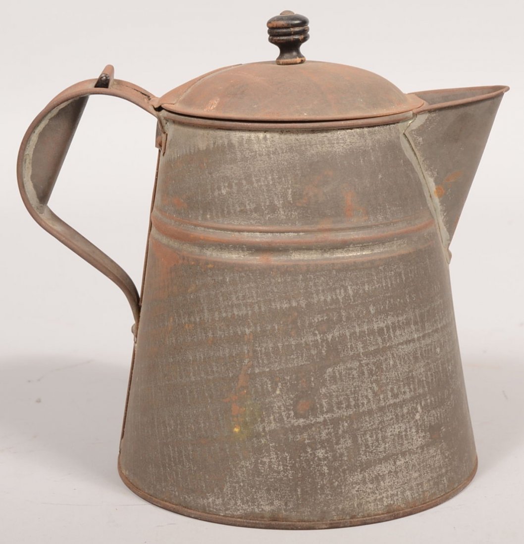 Medium Sized Tinned Iron Coffee Pot. Mid molding b: Medium Sized Tinned Iron Coffee Pot. Mid molding band on wide conical body with applied spout and loop handle with grip and hinged dome lid with black wood knob. 8 1/2"h. X 6 7/8"dia.