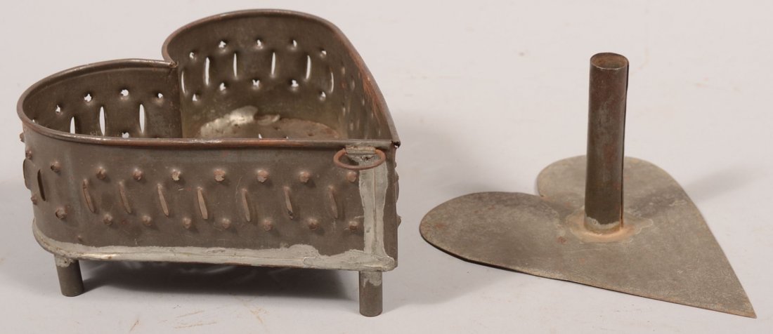 Punched Tin Heart Shaped Cheese Mold with Tamper. : Punched Tin Heart Shaped Cheese Mold with Tamper. Soldered form has slots and round holes for straining, three tubular legs and wire hanging loop and accompanied by a flat sheet plunger with cylindric