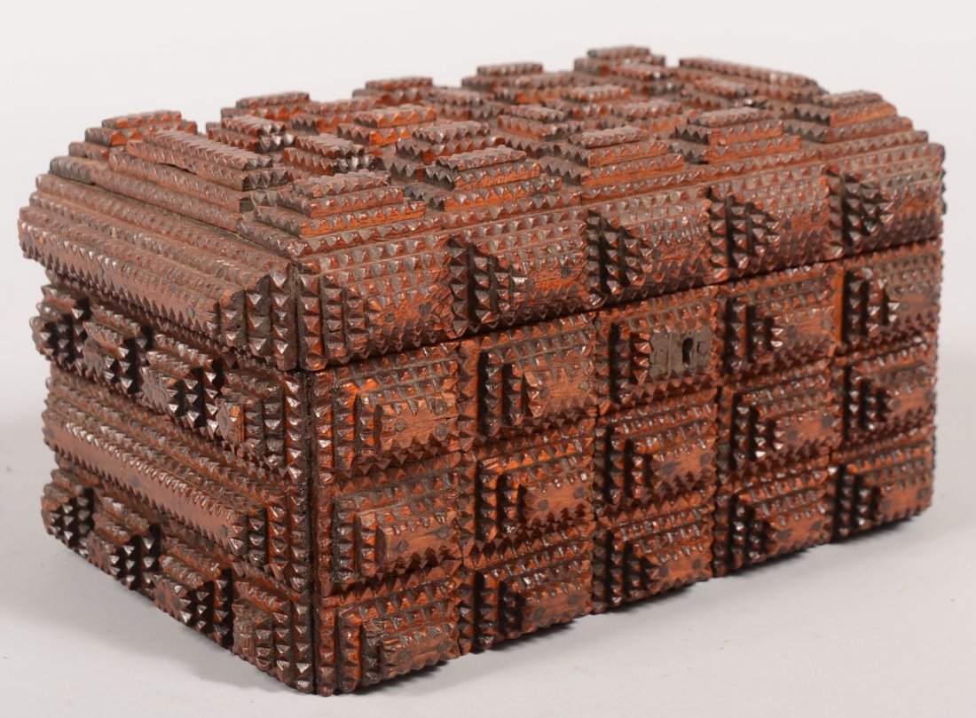 Tramp Art Lock Box. Surfaces covered much like a c: Tramp Art Lock Box. Surfaces covered much like a checkerboard with square and small rectangular pyramids of chip carved box wood with a dark stained and high gloss finish. Box resembles an armed box a