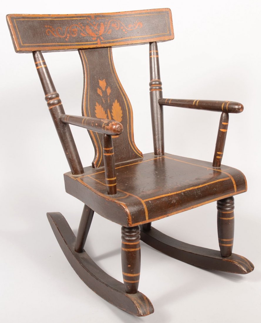 Child's Paint Decorated Plank Seat Rocking Chair. : Child's Paint Decorated Plank Seat Rocking Chair. Vasiform splat and solid curved top rail both with stencil decorations and outlining with additional line decoration throughout. Legs and back posts w