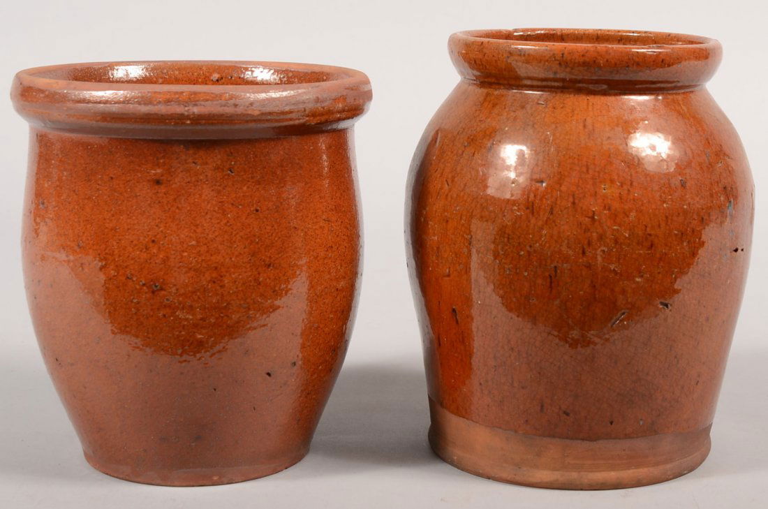 Two Salt Glazed Open Redware Crocks. An ovoid shap: Two Salt Glazed Open Redware Crocks. An ovoid shaped jar with rounded body tapering to a molded rim with inner shoulder for lid. No lid. 8"h. X 6 3/4"dia. Along with a wider open crock, swelled body a