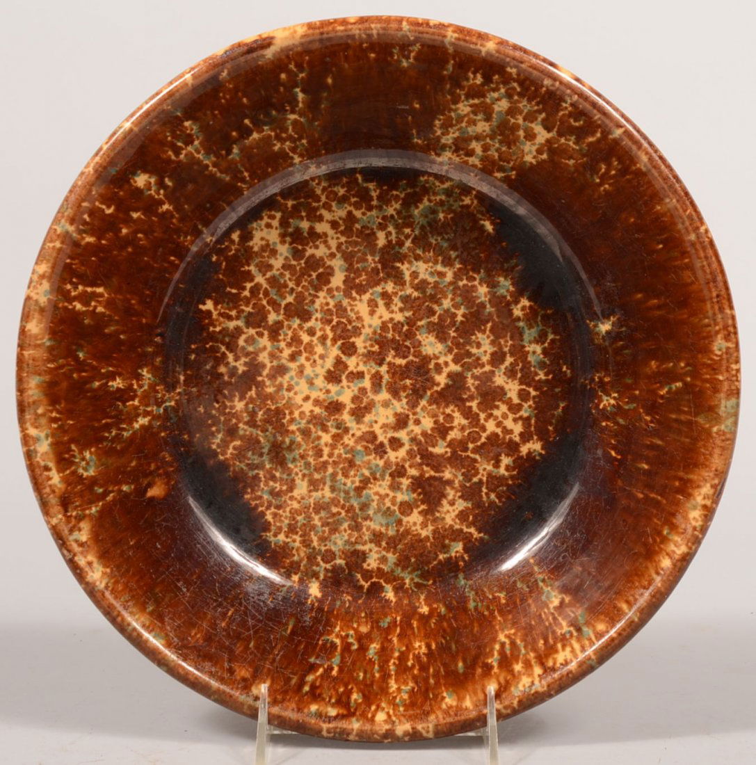 Deep and Wide Rockingham Milk Pan or Nappy. Brown: Deep and Wide Rockingham Milk Pan or Nappy. Brown speckling on Yellowware has additional blue infiltration. 2 3/4"h. X 11 7/8"dia.