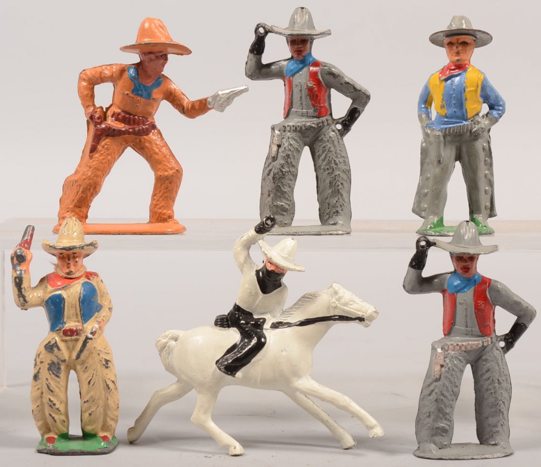 Six Painted Cast Metal Cowboys. Two gray chaps wit: Six Painted Cast Metal Cowboys. Two gray chaps with red vests; a white with blue; a gray with yellow and an orange chaps and shirt. All with matching hats. Along with a Lone Ranger look-a-like in whit