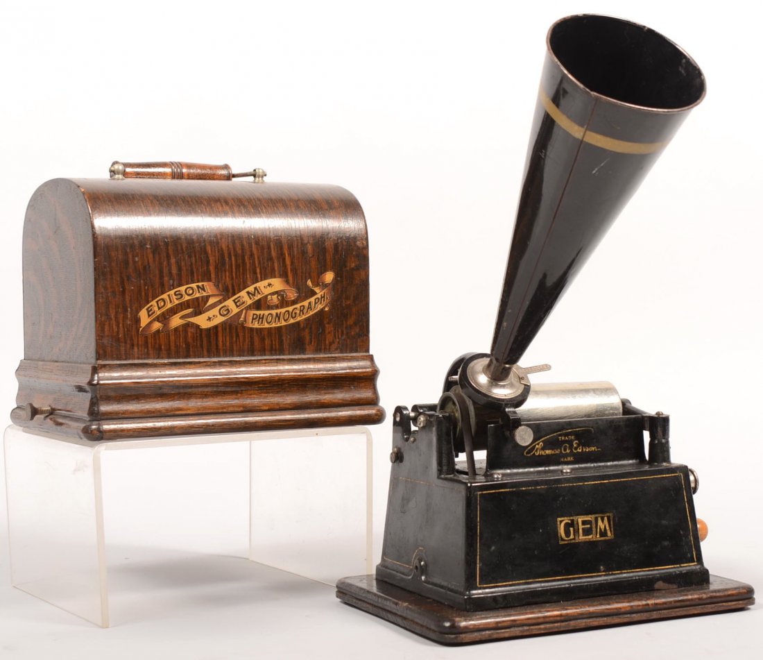 Edison "GEM" Cylinder Type Phonograph. Oak base an: Edison "GEM" Cylinder Type Phonograph. Oak base and handled cover with gold title decal on front. Crank handle and horn. 8"h. X 9 3/4"w.