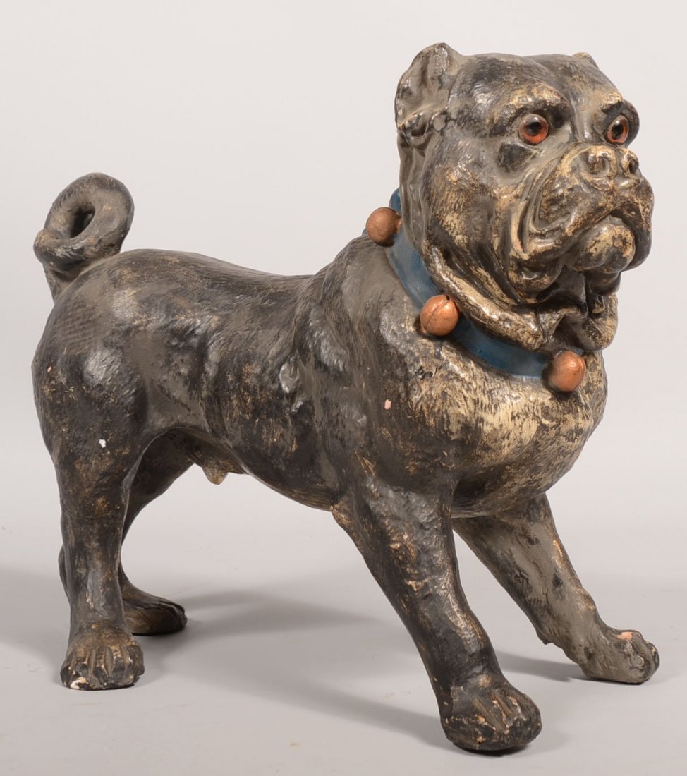 Painted Plaster French Bulldog with Glass Eyes. Ve: Painted Plaster French Bulldog with Glass Eyes. Very close to life size. Painted black with white accents, amber glass eyes and a blue collar with gold jingle bells. No makers marks. 14 3/4"h. X 17 1/