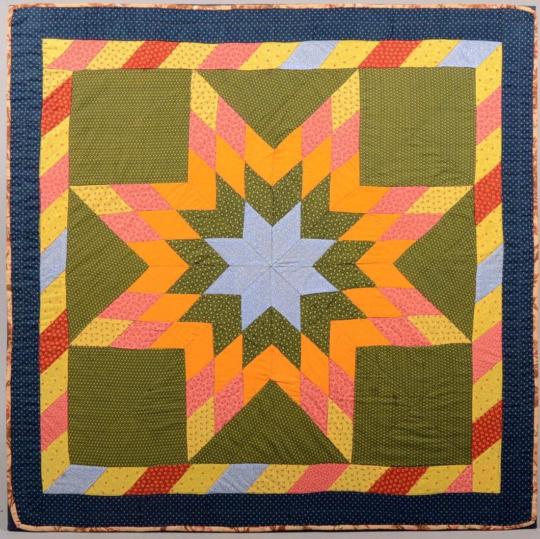 Eight Point Star Polychrome Calico Crib Quilt. Mul: Eight Point Star Polychrome Calico Crib Quilt. Multiple colored and patterned cotton calico fabric compose this handmade square crib quilt. Mounted on a fabric backing and attached to a wood stretcher