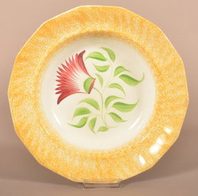 Yellow Spatter Thistle Pattern Paneled Soup Plate.