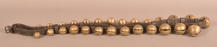 String of 27 Antique Brass Sleigh Bells.