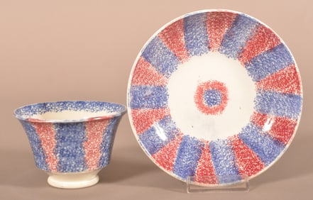 Red and Blue Rainbow Spatter China Cup and Saucer.