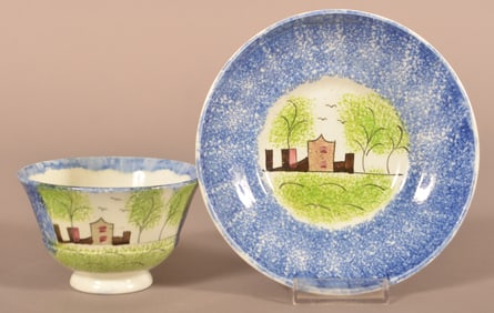 Blue Spatter China Fort Pattern Cup and Saucer.