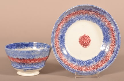 Red and Blue Spatter China Cup and Saucer.
