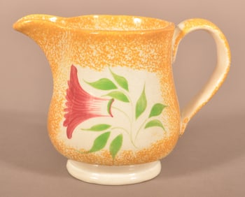 Yellow Spatter Thistle Pattern Cream Pitcher.