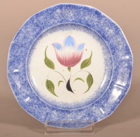 Blue Spatter Tulip Pattern Paneled Cup Plate.