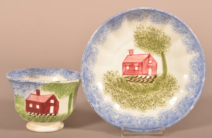 Blue Spatter Schoolhouse Pattern Cup and Saucer.