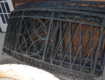 Four Sections of Slightly Curved Iron Fencing.