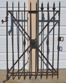 Iron Gate with Lion Head Medallion.