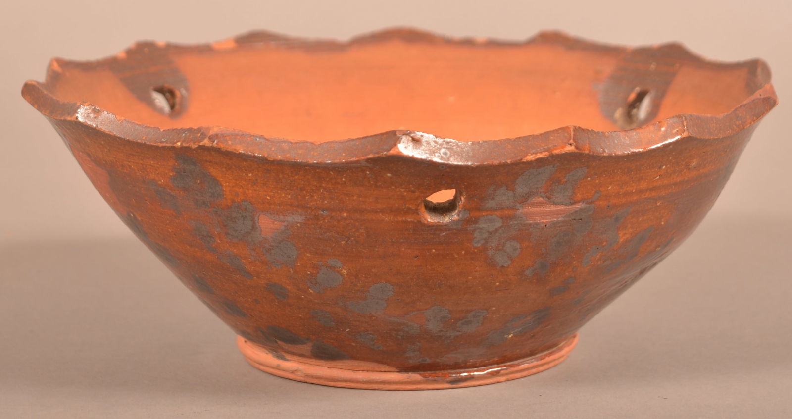 Antique Mottle-Glazed Redware Hanging Planter.: Antique Mottle-Glazed Redware Hanging Planter. Bowl form with scalloped rim and hanging eyelets. 9-1/2" diam.