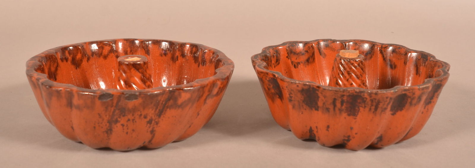 Two Antique Pennsylvania Redware Turks Molds.: Two Antique Pennsylvania Redware Turks Molds. Scalloped edge with mottled glaze. 8" diam.