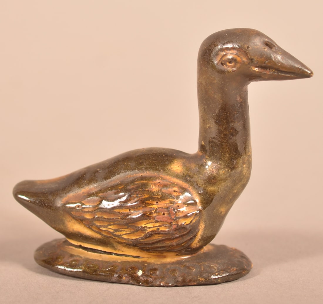 Pennsylvania Glazed Redware Bird Figure. (1 of 4)