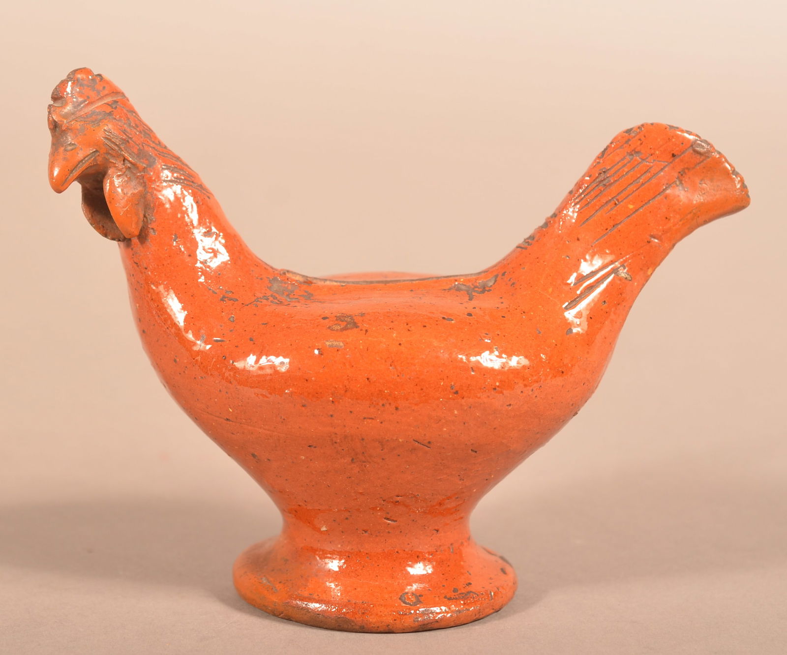 19th Century Glazed Redware Rooster Bank.: 19th Century Glazed Redware Rooster Bank. Hand-molded with incised features. 4-3/4'h. x 6"l.