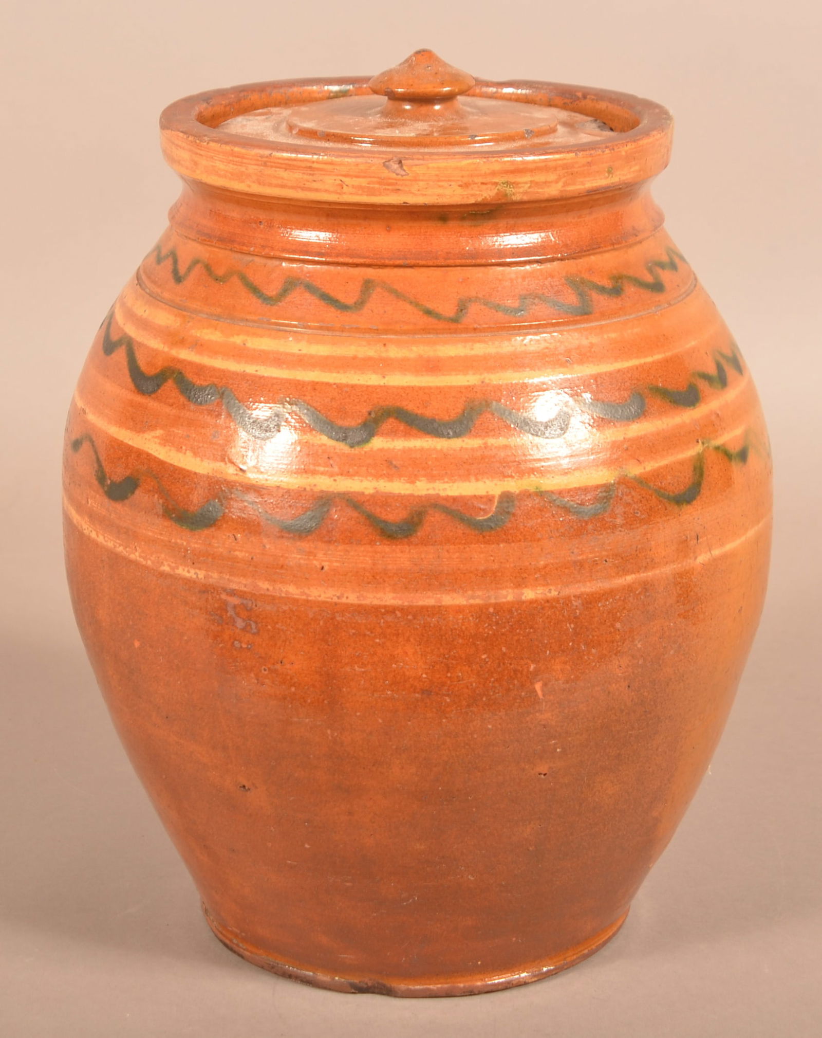 19th Century Slip-Decorated Redware Storage Jar.: Large 19th Century Slip-Decorated Redware Storage Jar. Flared square rim and bulbous body. 13"h.
