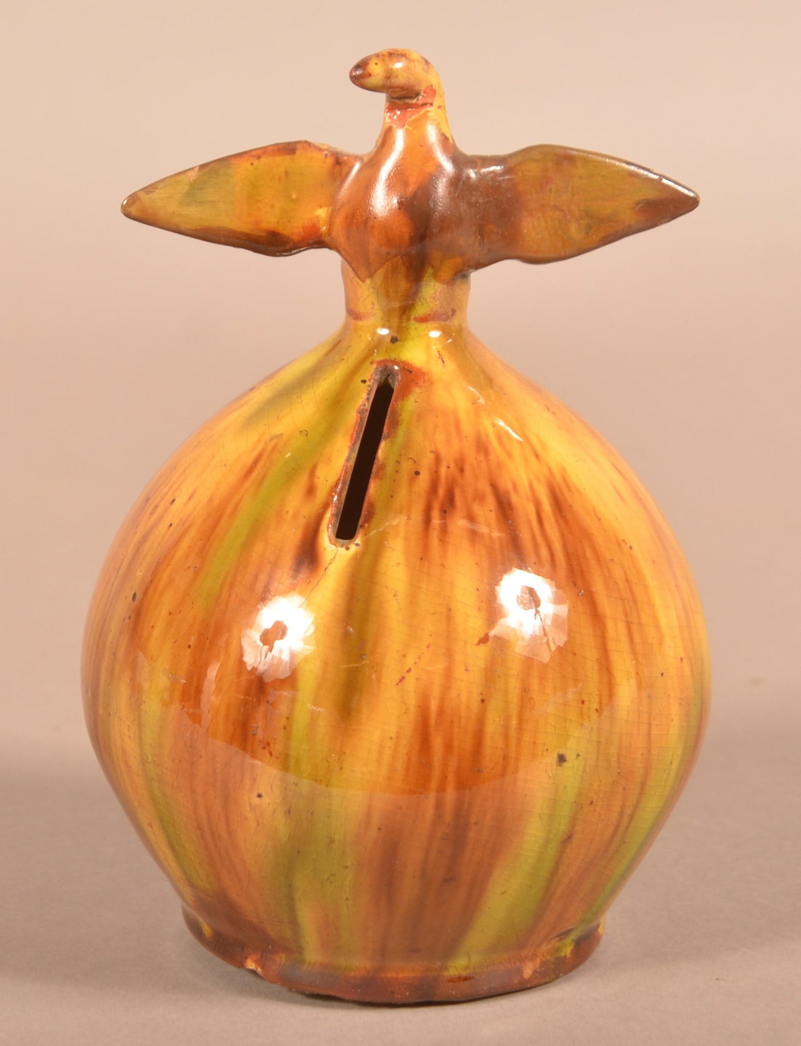 Mottle-Glazed Redware Bank with Eagle Finial.: Antique Mottle-Glazed Redware Bank with Eagle Finial. Ovoid form with spreadwing eagle finial. 6-3/4"h.