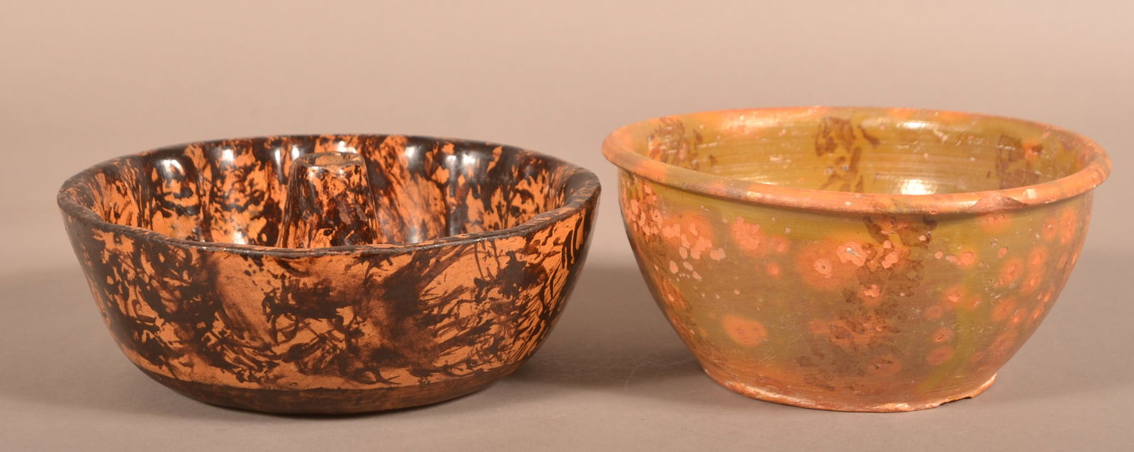 Two Pieces of Antique Glazed Redware.: Two Pieces of Antique Glazed Redware. Unusual glazed Turk's mold, 8-3/4" diam. and a green and orange glazed bowl, 8" diam.