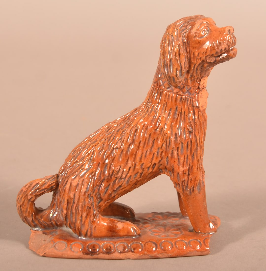 PA 19th Century Redware Seated Dog Rattle.: PA 19th Century Redware Seated Dog Rattle. Hand-molded with carved features. 5-1/2"h.
