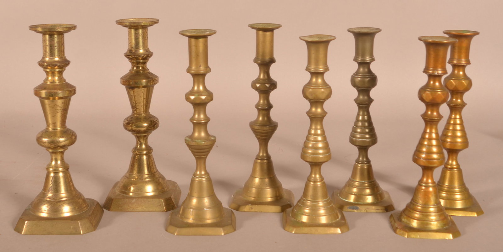 Four Pairs of English Antique Brass Candlesticks. (1 of 3)