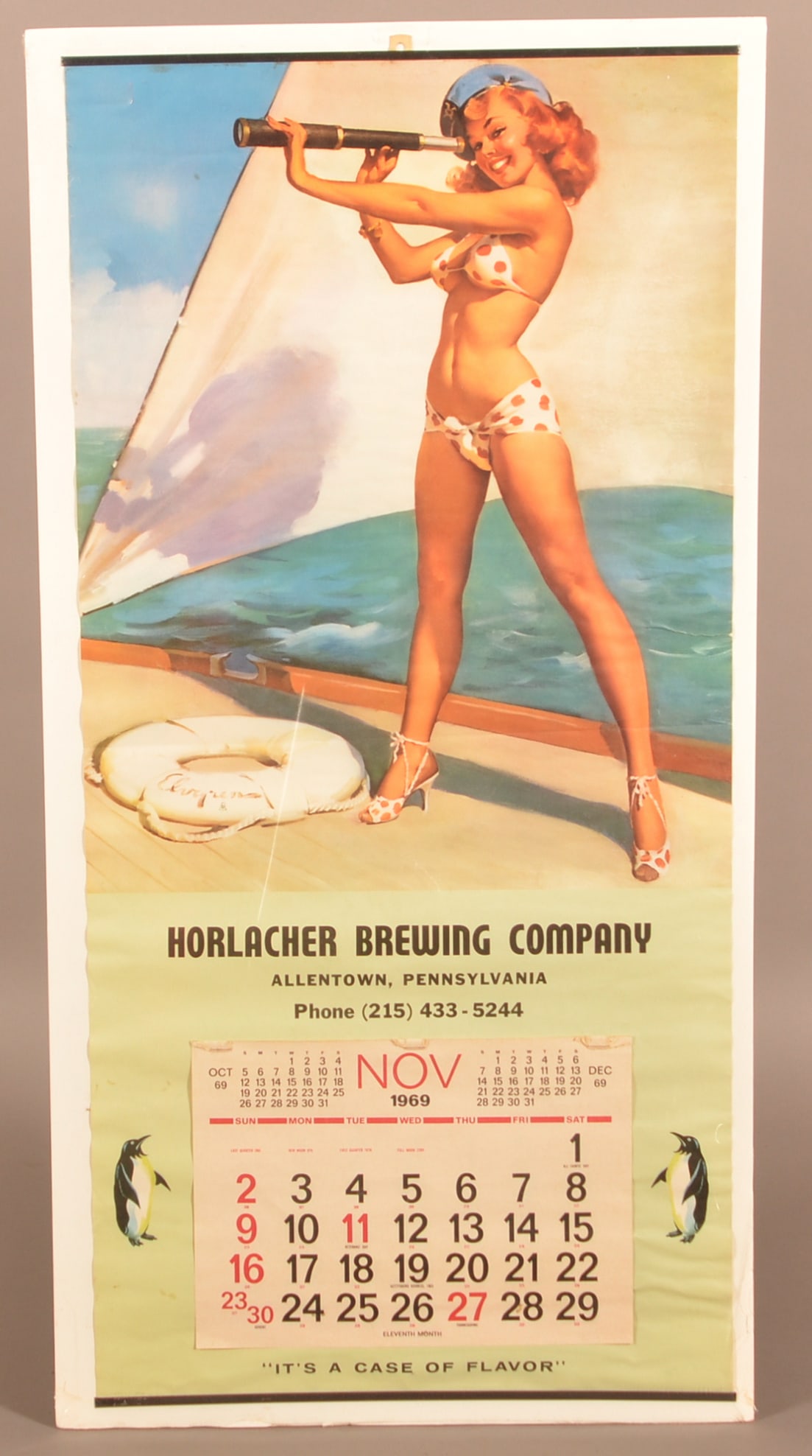 1969 Horlacher Brewing Co. Advertising Calendar.: Allentown, PA, depicts a young lady standing on a sailboat holding a telescope, with penguin mascot flanking calendar sheet. Lithograph copyright B & B, U.S.A. 16" x 33-1/2".