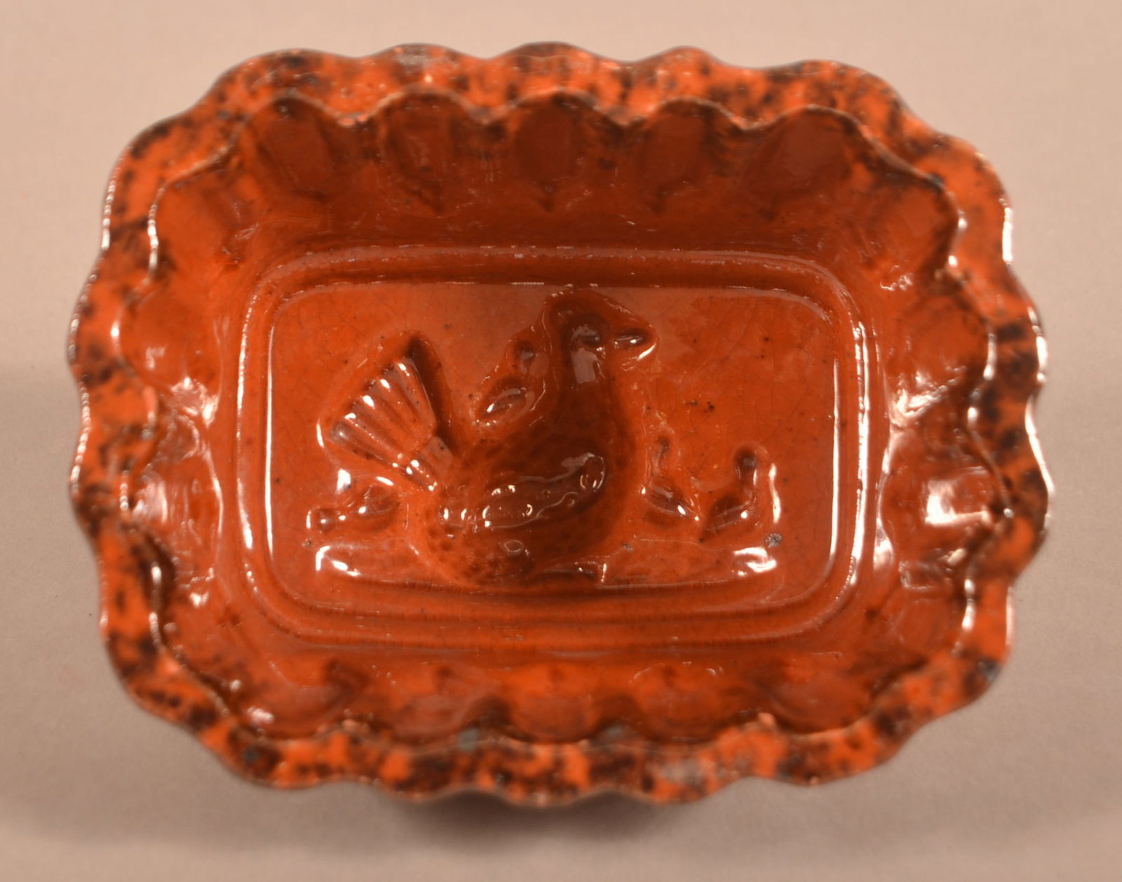 Unusual 19th C. Redware Food Mold with Chicken.: Unusual 19th Century Redware Food Mold with Chicken. Sponge-mottled glaze with scalloped rim and impressed hen with 4 peeps in base. Provenance: The late Eugene and Vera Charles, Lancaster, PA. 3-3/4"