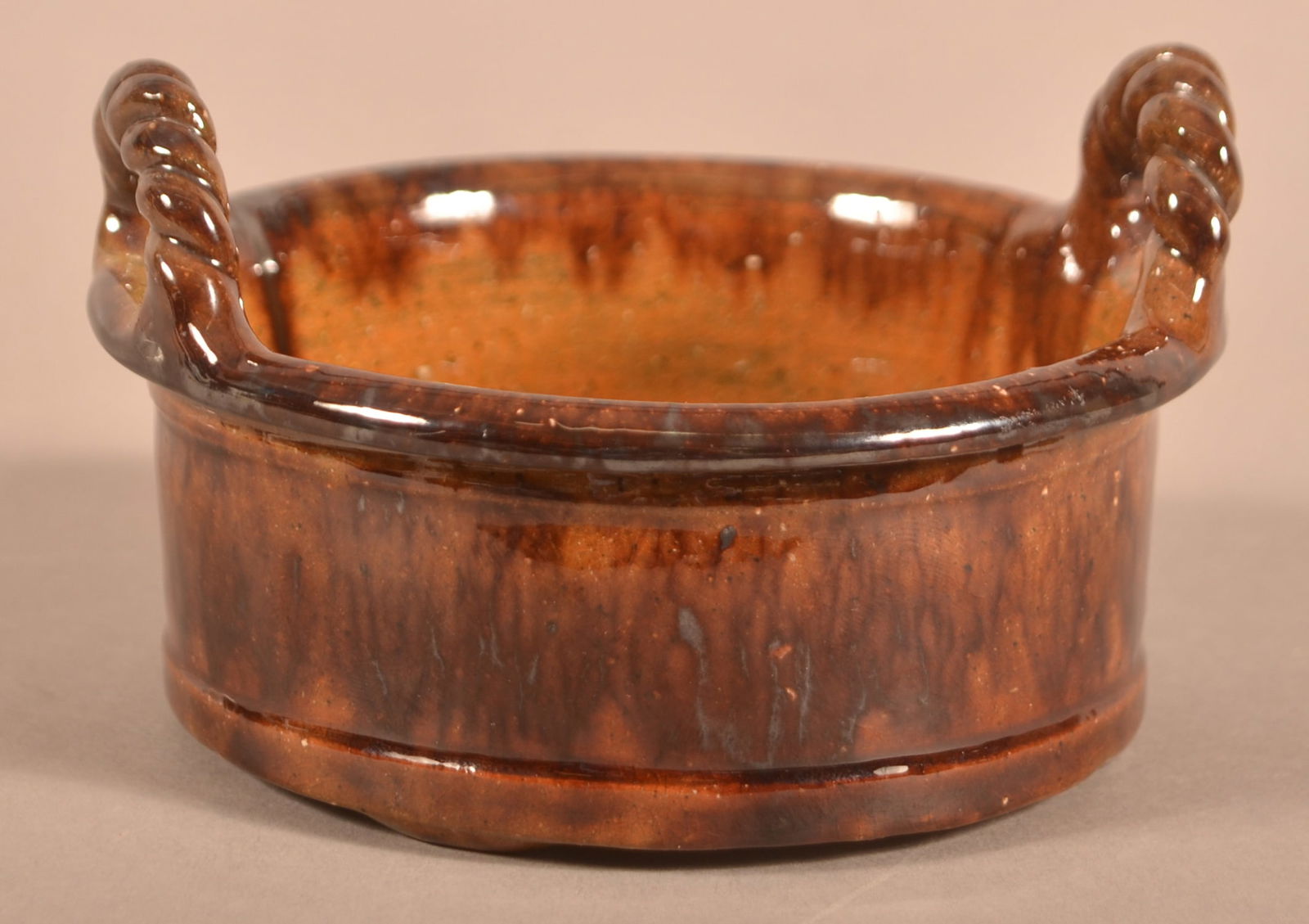 John Bell Mottle-Glazed Redware Butter Tub.: John Bell Mottle-Glazed Redware Butter Tub. Impressed "John Bell" (Waynesboro, PA). Inscribed under glaze on base "Routh Poe, Leitersburg, Md., Dec. 25, 1881". With open rope twist handles. Provenance