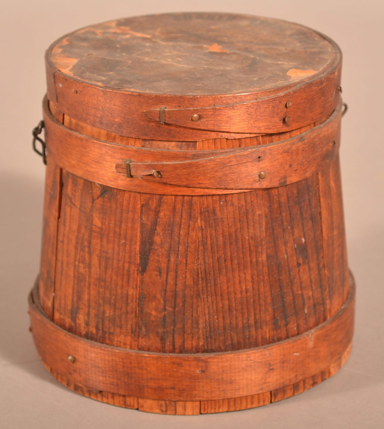 Shaker Applesauce Wood Firkin.: Shaker Applesauce Wood Firkin. Labeled "The Canterbury Shakers, Canterbury, NH". Wire bail swing handle with wood grip, vertical staves with tapered overlapping support bands having copper tack and st