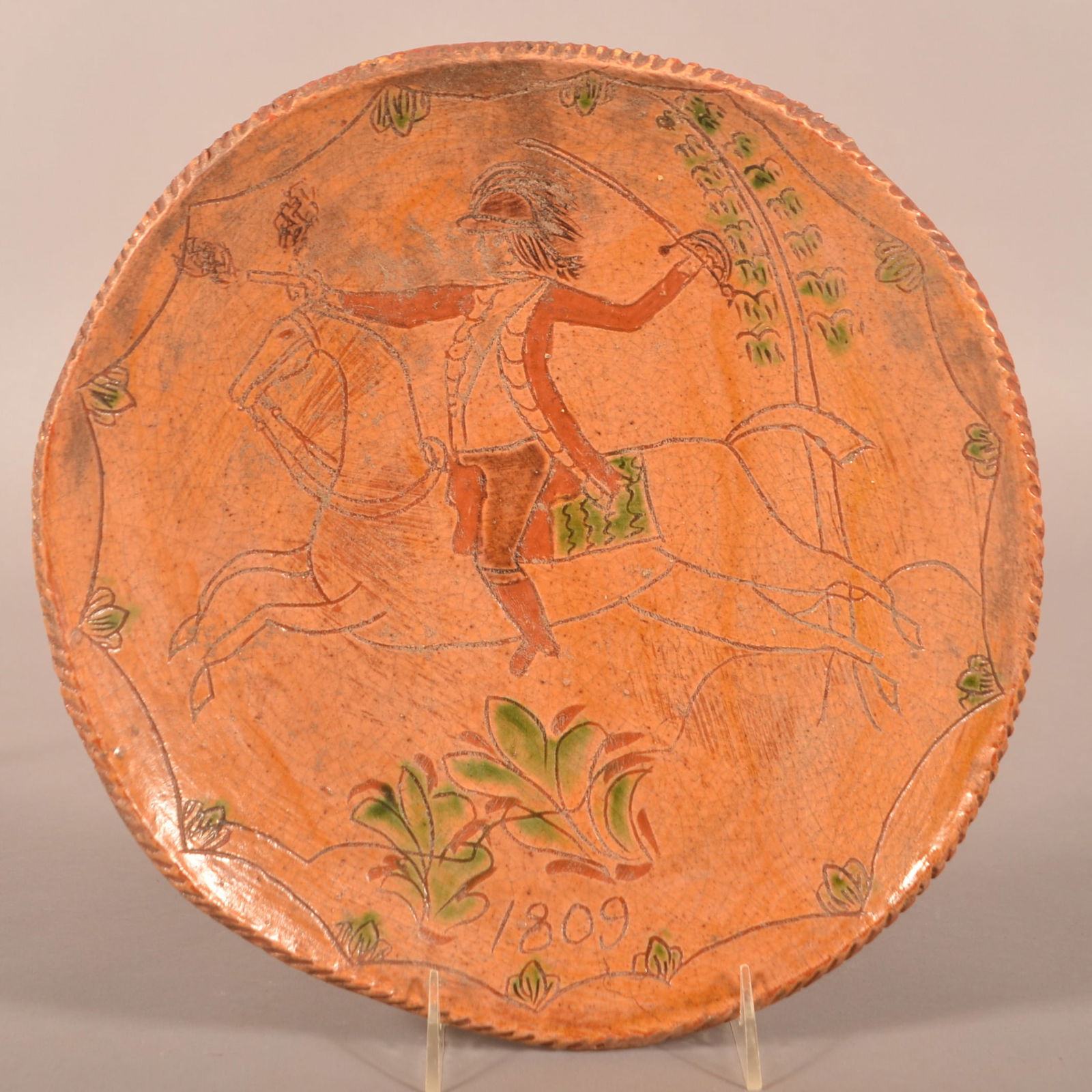 Redware Sgraffito Plate Attributed to John Neis.: Redware Sgraffito-Decorated Plate Attributed to John Neis. Montgomery County, Upper Salford Township, Pennsylvania, dated 1809. Soldier on horseback holding a pistol and sword sgraffito decoration. Ha