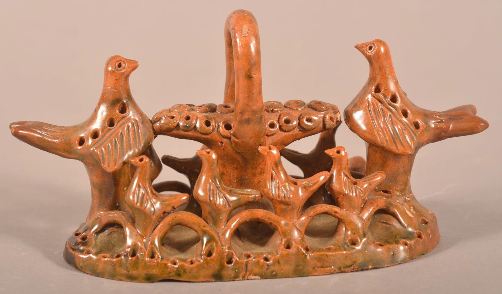 Rare PA Redware Bird Figural Group Whistle.: Rare Pennsylvania 19th Century Redware Pottery Bird Figural Group Whistle. Green and orange mottled glaze, hand-molded oval slab base with central basket flanked by two larger birds and four smaller b