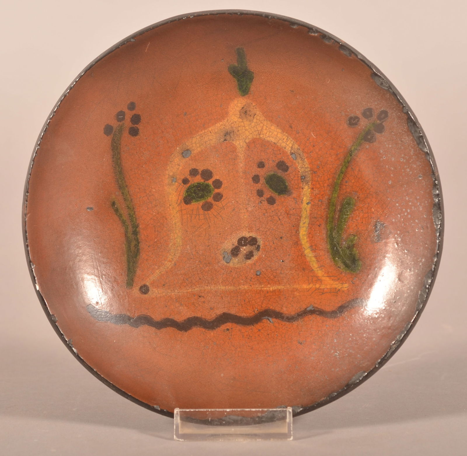 PA 19th C. Redware Plate with Slip Decoration.: Pennsylvania 19th Century Redware Plate with Bee Skep Slip Decoration. Small 3-color slip plate with stylized bees, reeds and a central bee skep. Provenance: The late Jan Paden, Duncannon, PA. 7" diam