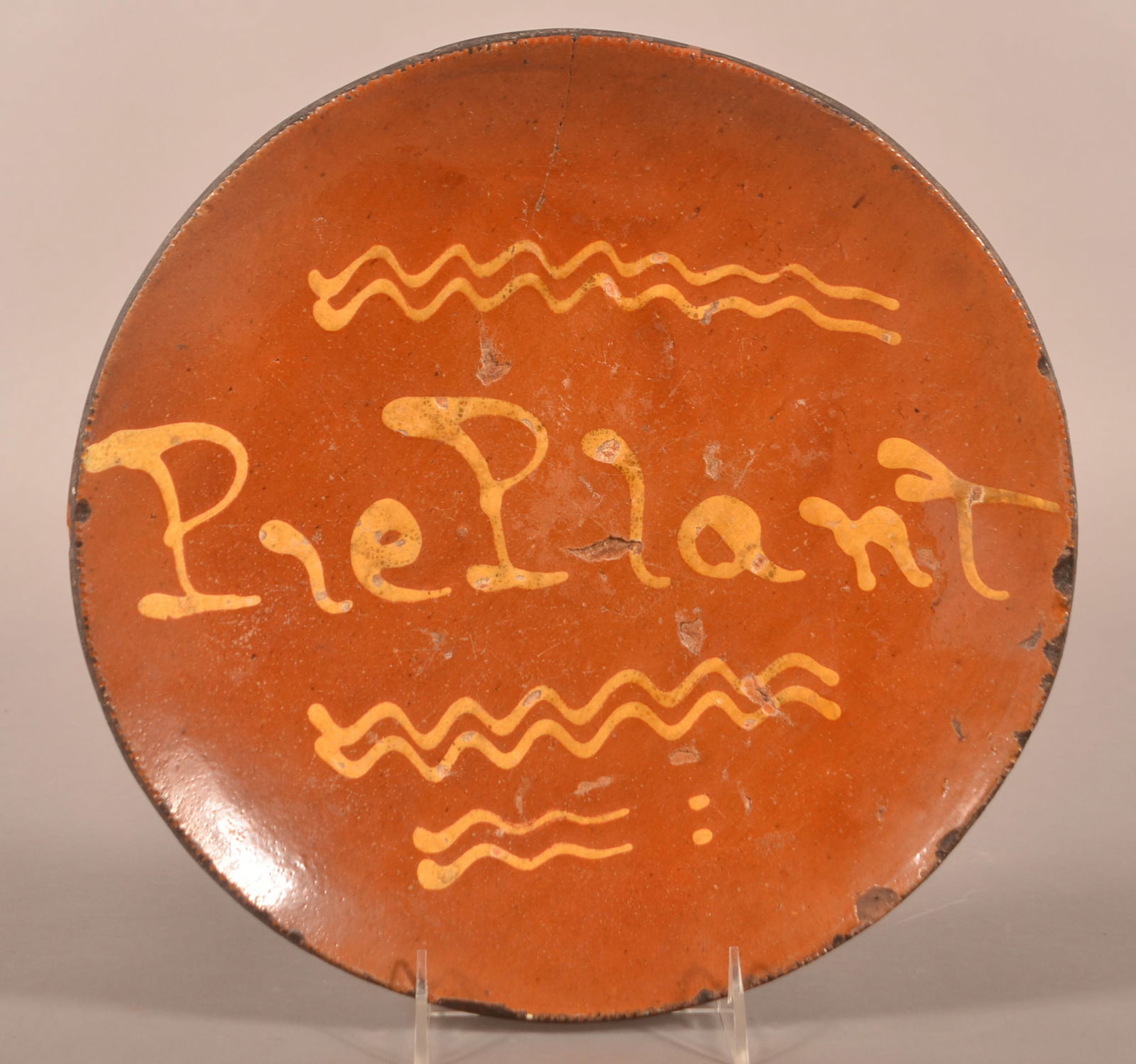 Antique Redware Yellow Slip "Pie Plant" Plate.: Antique Redware Yellow Slip "Pie Plant" Plate. Provenance: The late Jan Paden, Duncannon, PA. 11-3/4" diam.