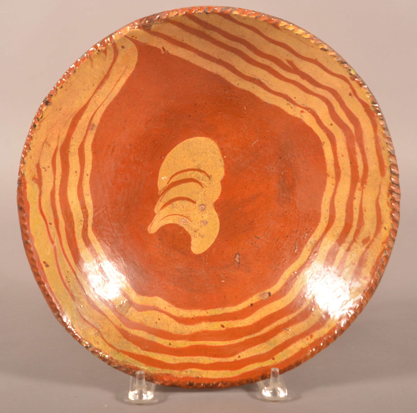 Antique Yellow Slip Redware Shallow Bowl.: Antique Yellow Slip-Decorated Redware Shallow Bowl. Coggle wheel edge. Provenance: The late Jan Paden, Duncannon, PA. 12" diam.