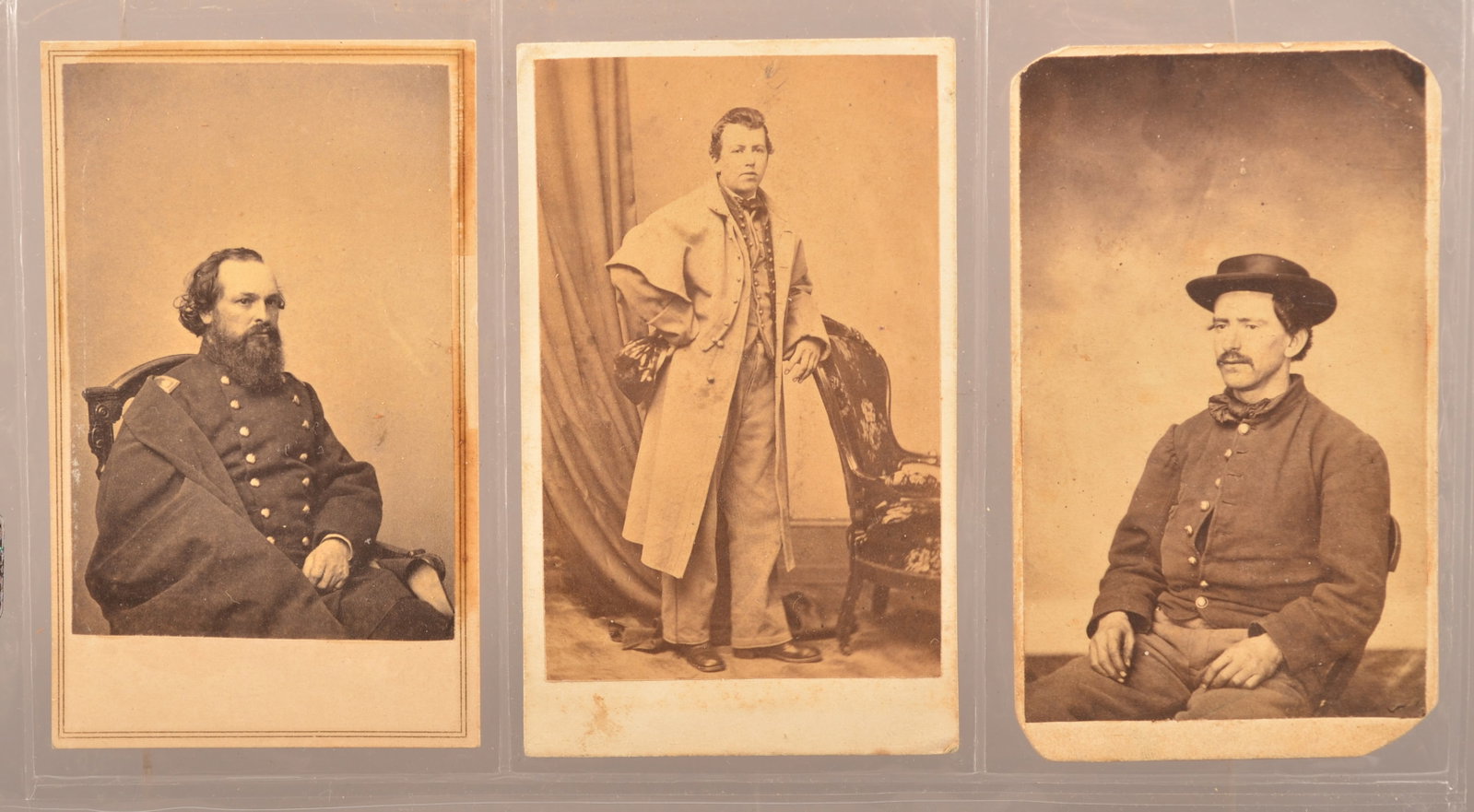 CDV Images from the 71st, 72nd & 73rd Pennsylvania: Seated view taken by Brady of Major Robert Parrish, 71st Pa. Enlisted in 1861 and discharged by special order in July, 1862. ID appears to be Roger Hunt's handwriting. Full standing view of an unident